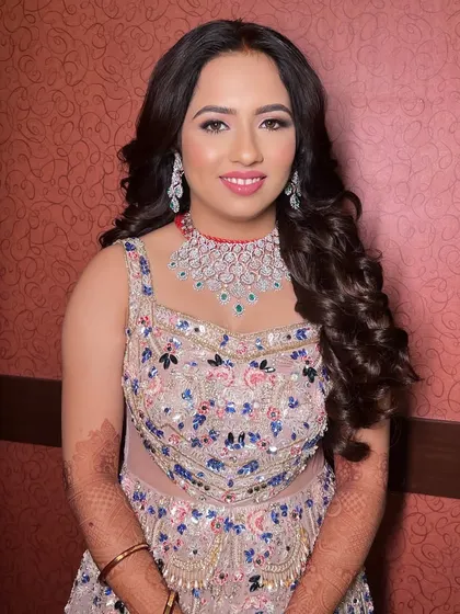 A close-up portrait of the bride, her makeup looking fresh and modern.