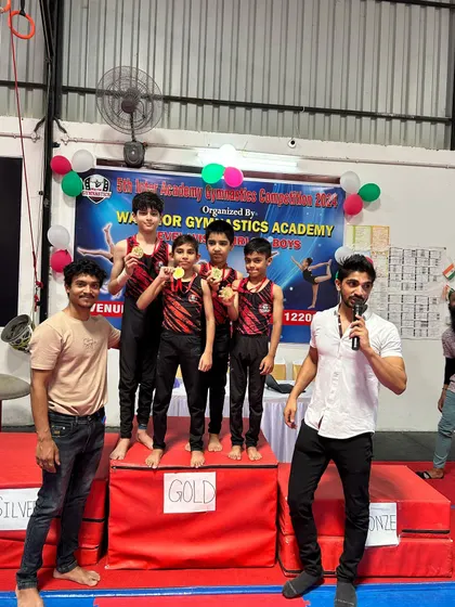 On the podium at our 5th Intra-Academy Competition. These internal meets give my gymnasts valuable experience in a competitive setting.