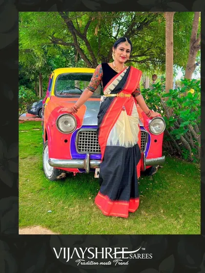 A playful and stylish shot of Deepa with her classic Kanchi cotton saree, showcasing its versatility.