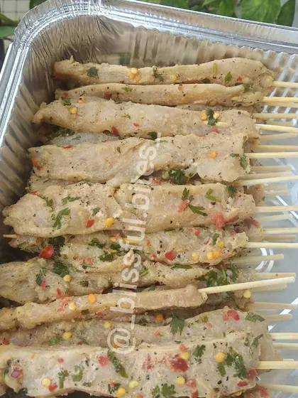 My Saucy and Spicy Satay Chicken skewers, ready for a party. These tender chicken strips are marinated in a flavorful blend of Indo-Chinese spices and are perfect as a starter.