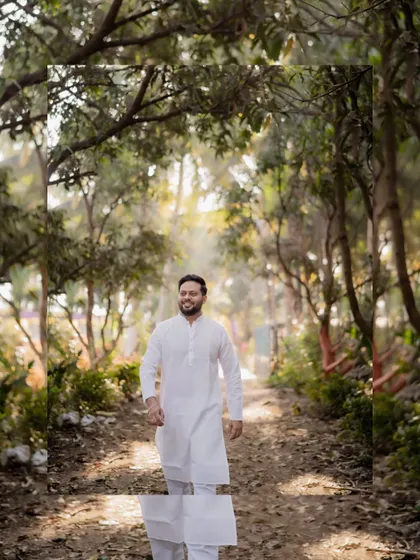 A portrait of the groom walking through a sun-dappled path before his Haldi ceremony begins.