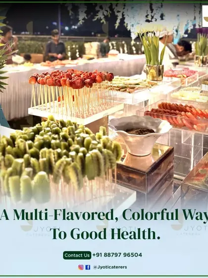 A multi-flavored, colorful way to good health. This fruit station features skewers of fresh kiwi and strawberries, offering a healthy and delicious option for guests.