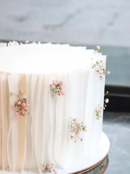 A close-up of the wafer paper details, showing how it creates a soft, fabric-like texture.