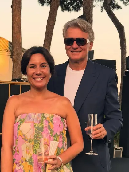 Our client from Ibiza styles a bespoke navy blazer with a simple white t-shirt, showcasing effortless European elegance.