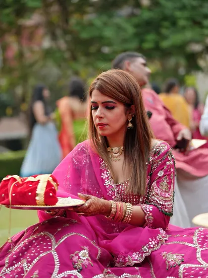 The client holding her thali, ready for the evening's rituals.