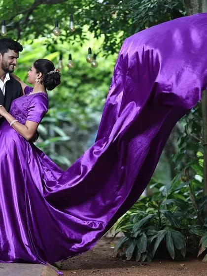 A dance in the park. The movement of the purple flying gown makes this pre-wedding photo look so dynamic and full of life.