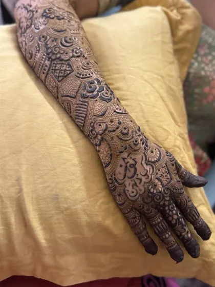 This is a detailed view of my intricate bridal henna work. Each design is unique, combining traditional patterns like paisleys and mandalas with fine-line fillers to create a stunning, full-coverage look for your special day.