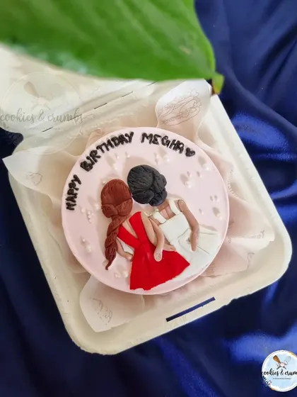 For the sister you can't live without. This bento cake was for a best friend's birthday, featuring a hand-painted design of two friends, making it a super personal gift.
