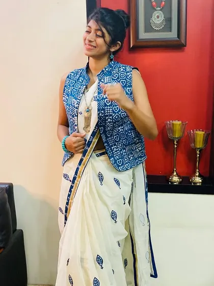 A playful pose in the white and indigo Navratri outfit. It’s a look that is both traditional and contemporary.