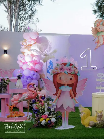 A close-up of our fairy theme decor, featuring a life-sized fairy cutout, a friendly deer, and a beautiful balloon arrangement. Every element is chosen to build an enchanting atmosphere.