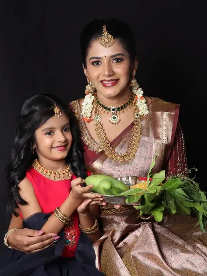 A beautiful shot of the mother and daughter sharing a moment.