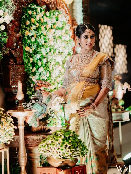 A shot of me standing by a Ganesha idol, the traditional setting adding to the auspiciousness of the occasion.