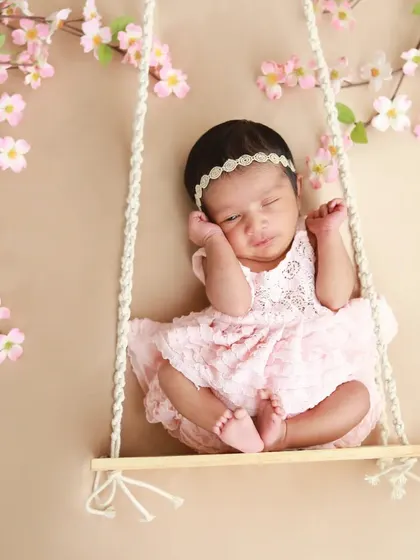 A little princess dreaming on a swing surrounded by cherry blossoms. This is one of my favorite props for creating a magical, fairytale feel.