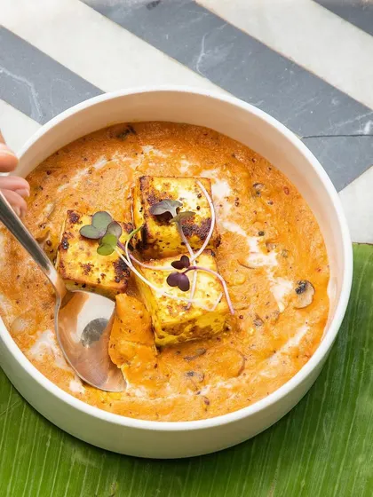A spoonful of our creamy Kasundi alla Crème, a vegetarian delight from our special menu.