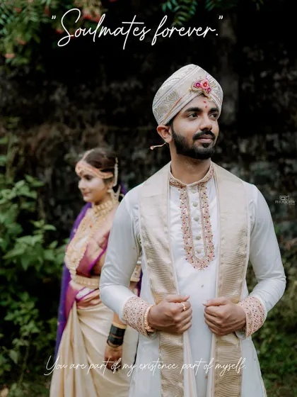 A beautiful portrait of the groom with his bride in the background, capturing a moment of anticipation.
