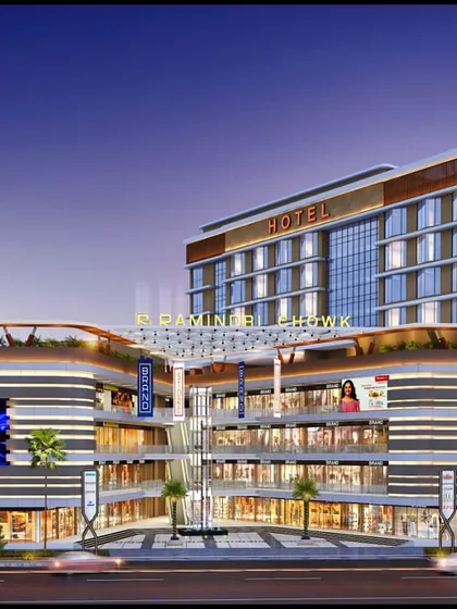 A landmark mixed-use project combining a hotel and a multi-level retail complex. The design features large digital screens and a layered facade to create a vibrant, urban destination that stands out.