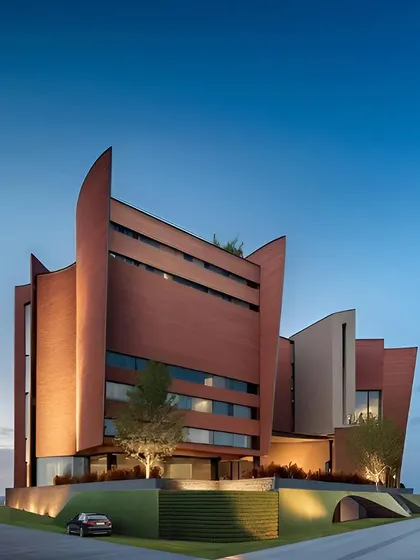 A perspective view of the building, emphasizing its sculptural, curving forms.