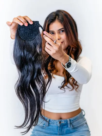 Here is a look at our 100% real human hair wrap-around ponytail. It's soft, sleek, and designed to give you an effortlessly glamorous look that feels completely natural.