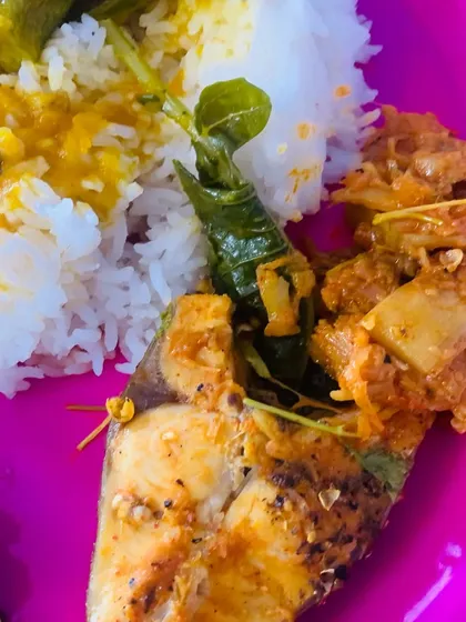 A simple lunch with pumpkin curry, greens from my garden, fish cooked with bamboo shoot, and a roasted chilli and Aneshi chutney.