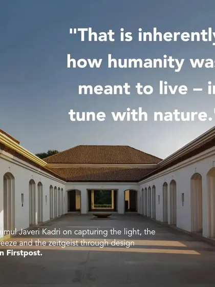 A view through the colonnaded corridor frames the central courtyard, demonstrating our philosophy of designing spaces that are in tune with nature, light, and air.