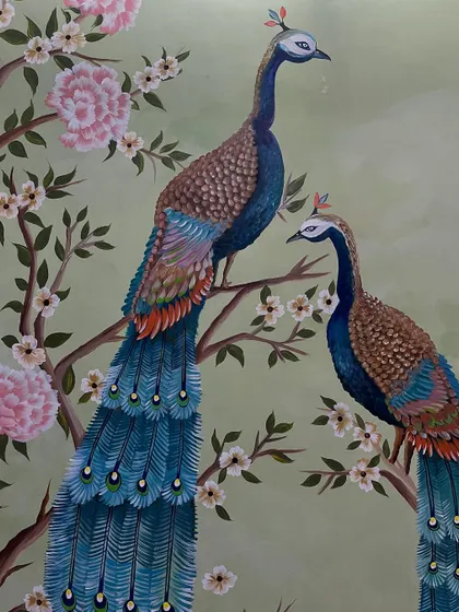 A detail of the two peacocks, showing their graceful poses.