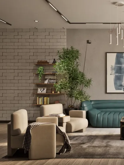 This seating area features a mix of soft, rounded armchairs and a brick-textured wall. The combination of neutral tones and natural textures creates a cozy and intimate corner within the larger living space.