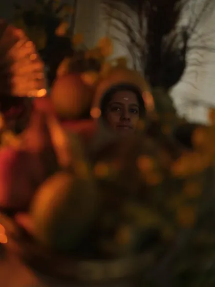 A creative self-portrait reflected in the 'valkannadi' (mirror) of the Vishu kani, blending the personal with the traditional.