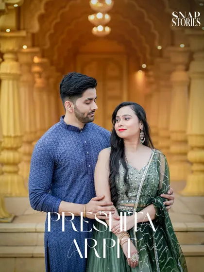 For a touch of royalty, I use heritage locations with intricate designs. This couple's portrait, set against a golden, palace-style backdrop, highlights their traditional attire and creates a timeless, regal photograph.