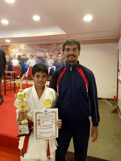 Posing with a student who won first prize at the Goju-Ryu National Open Karate Championships.