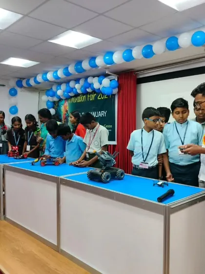 Students from a local school get a hands-on demonstration of various robotic projects at an Innovation Fair. We love participating in community events to spark curiosity in science and technology.