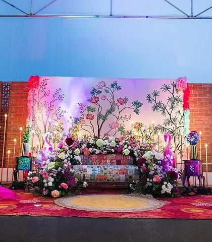 The same beautiful Mehendi stage, offering a complete view of the setup that is perfect for capturing memorable photos.