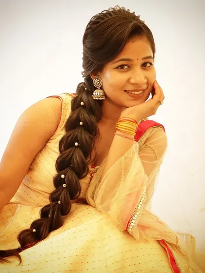 A beautiful cells braid hairstyle for a wedding day occasion. This intricate braid looks stunning and is a great skill to offer your clients.