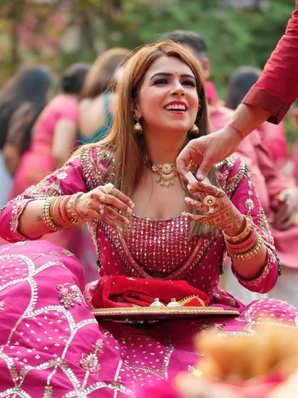A happy, smiling moment from the Karwa Chauth celebration.