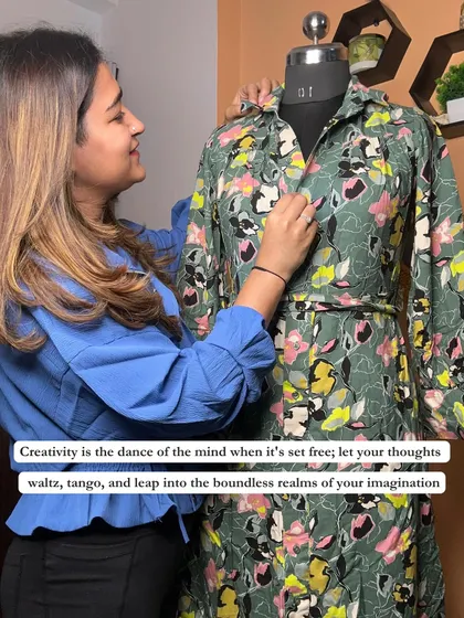 Creativity is the dance of the mind. Here I am, working on a mannequin, bringing a creative vision to life by styling a floral print dress.