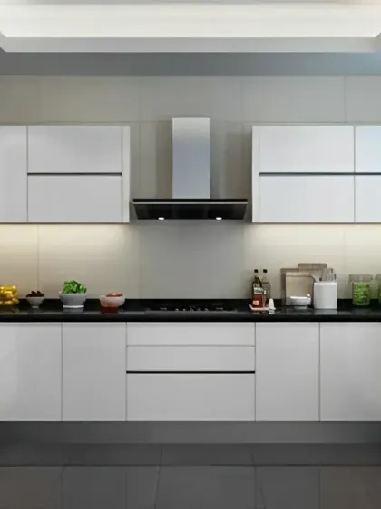 This U-shaped kitchen features a classic black and white color scheme with high-gloss, handleless cabinets. The layout provides ample counter space and an efficient work triangle.