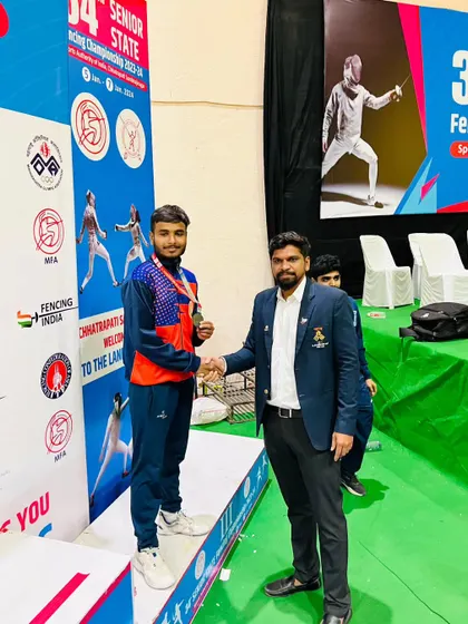 Congratulating our fencer on his bronze medal win at the 34th Senior State Fencing Championship. It is rewarding to see our athletes succeed in the highly competitive senior category.