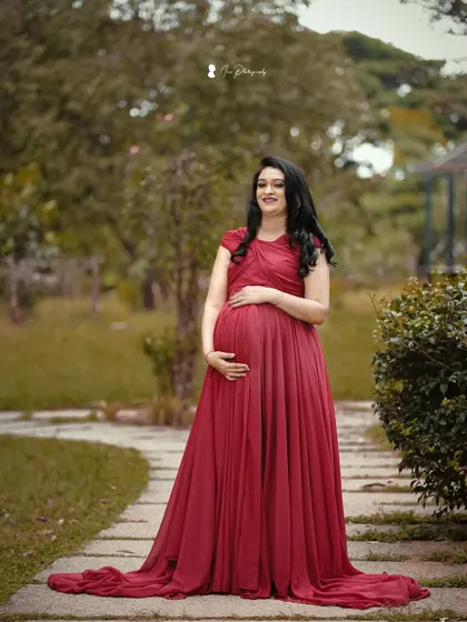 Another beautiful shot in the red gown. The makeup is designed to look flawless in natural light.