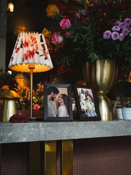 Framed photos of the couple are a simple yet powerful way to personalize a space and share their love story with guests.