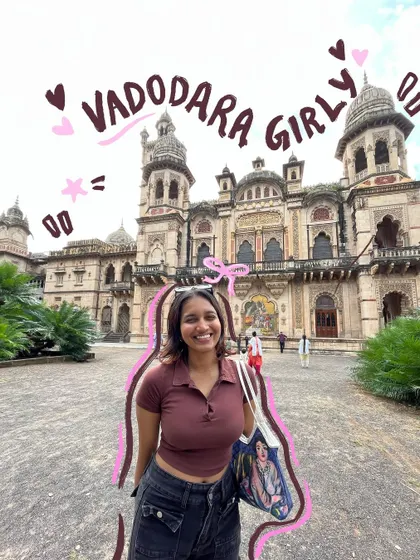 Proud Vadodara girlie. This photo in front of the palace gets a cute title and a pink outline.