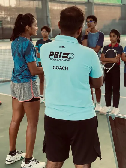 I believe in giving back to the next generation of Indian tennis. Here, I'm talking to young players at the PBI Tennis Academy about the importance of mental toughness, sharing techniques like meditation and visualization that I use on tour.
