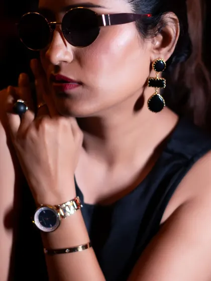 A close-up shot highlighting the accessories from the influencer's look. Detail shots like this are great for posts that tag multiple brands.