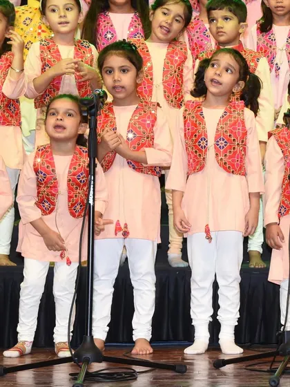 A close-up of our little stars during a stage performance. We ensure they are dressed in beautiful costumes to make the experience even more special for them.