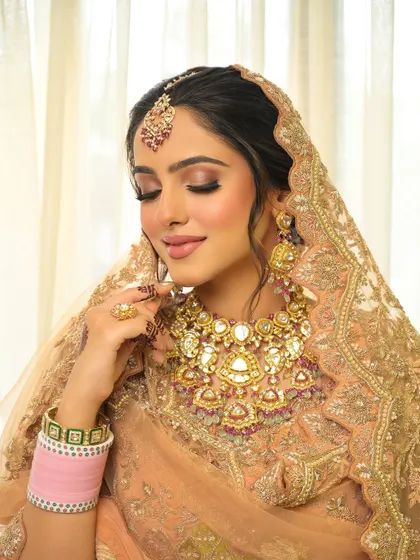 A serene portrait showing the soft shimmer on the eyelids and the perfectly blended blush that gives a healthy, natural flush.