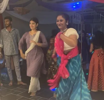 Students enjoying a freestyle moment during our Dandiya party. It's not just about choreography, it's about feeling the music.