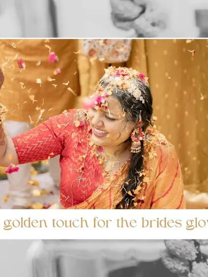 A beautiful, candid moment of the bride, Divyanshi, tossing flower petals in the air with a joyful expression.