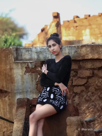 Using the texture of old, rustic walls as a backdrop for a modern fashion portrait. The contrast between old and new is always interesting.