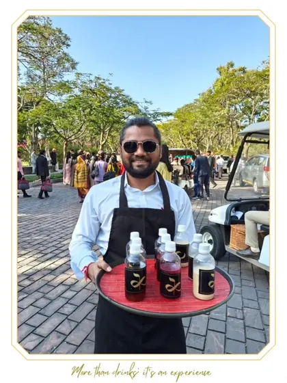 Our bartender serving pre-batched cocktails on a tray, ensuring quick and convenient service for guests on the move.