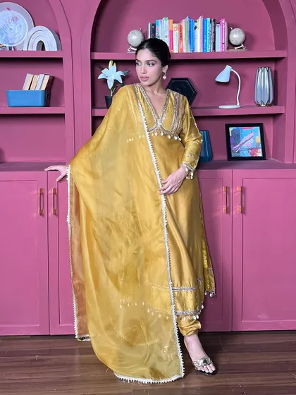 Bhumi Pednekar celebrating her birthday in a stunning mustard yellow suit. The gota patti work and organza dupatta make it a perfect festive choice.