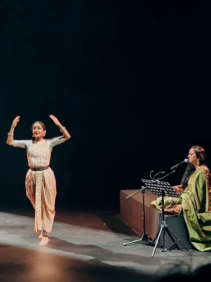 A performance shot from 'Mandala'. The simple costumes and bare stage put the focus entirely on the music and the movement, creating a very raw and honest experience.