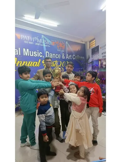 A moment of shared victory as our young students proudly hold up a trophy at the Annual Solo Fest. We believe in celebrating every achievement, big and small, to build confidence and team spirit.